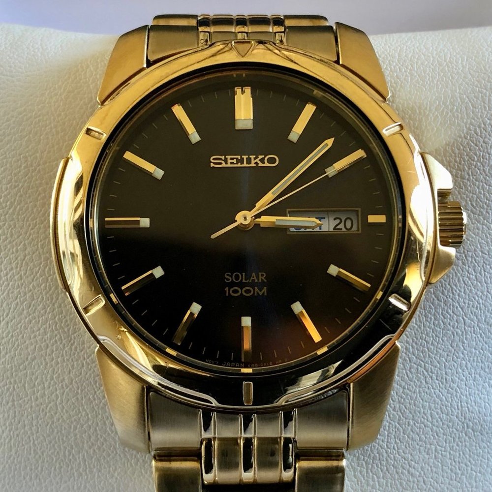 Seiko Gold Case Black Dial Solar Bracelet Watch